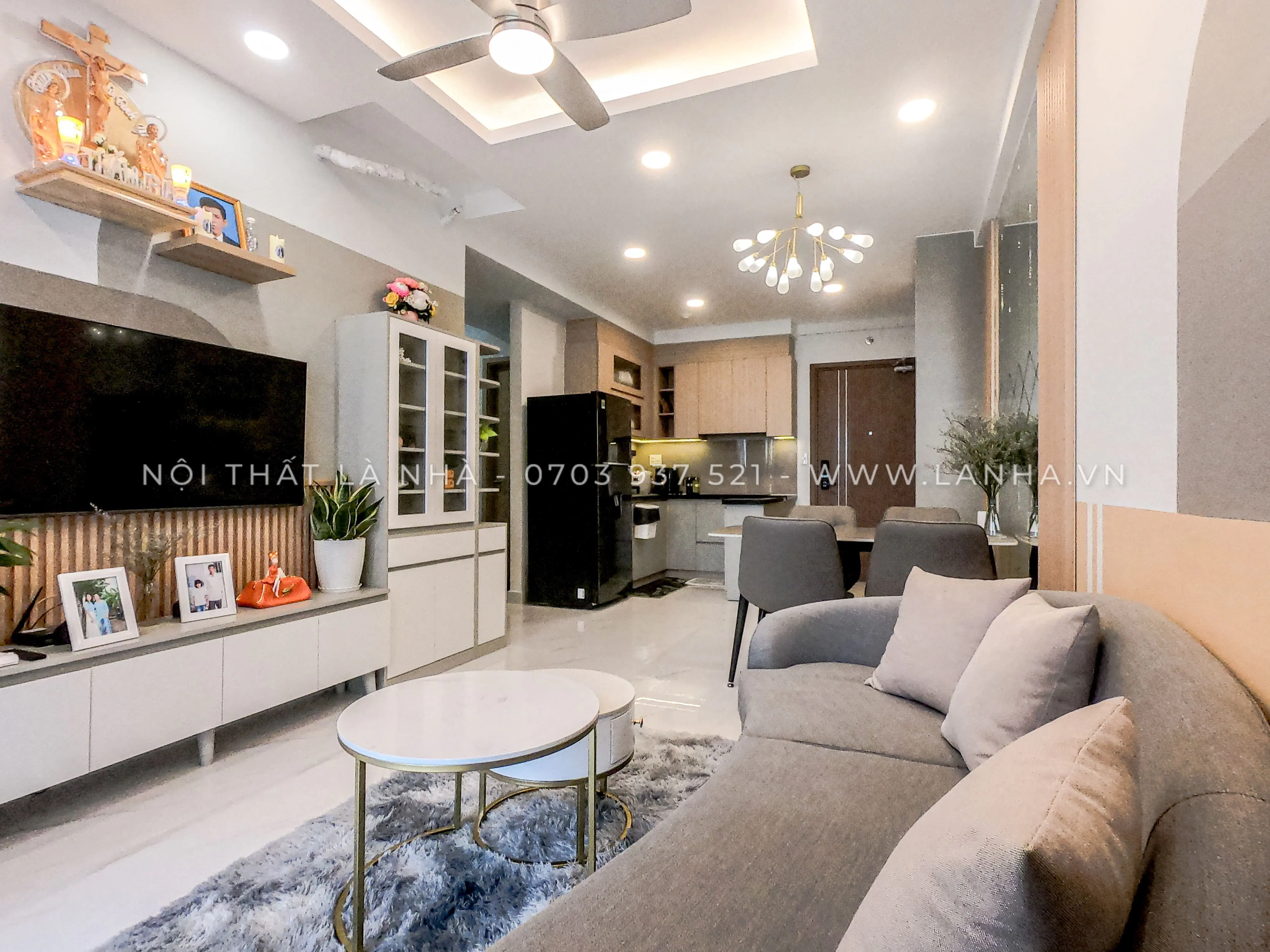 Thiết kế phòng khách chung cư thông với phòng bếp